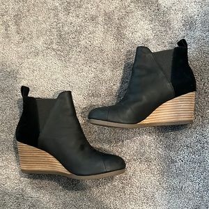 Black Tom’s booties never worn